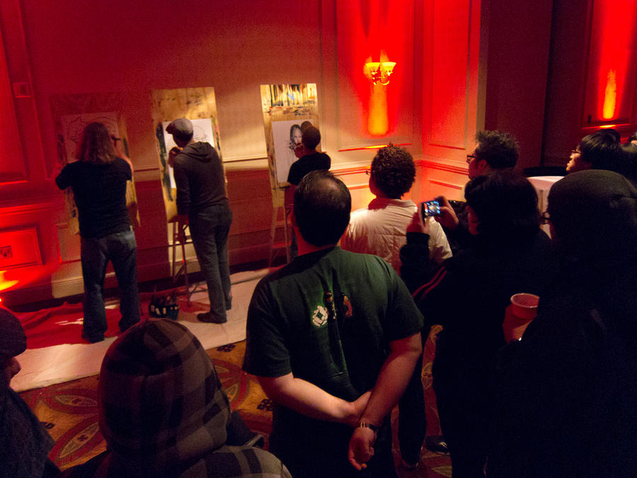 Partygoers watch the artists