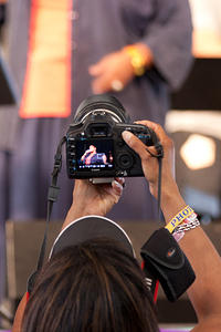 Reaching for a photo