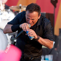 Bruce opens a beer
