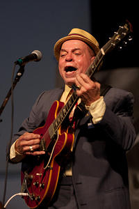 Deacon John on guitar