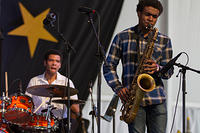 Miles Labat on drums
