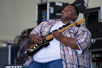 Derwin Perkins on guitar
