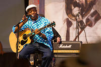 Buddy on acoustic guitar