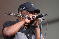 James plays the harmonica