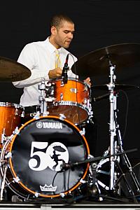 Miles Labat on drums