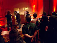 Partygoers watch the artists